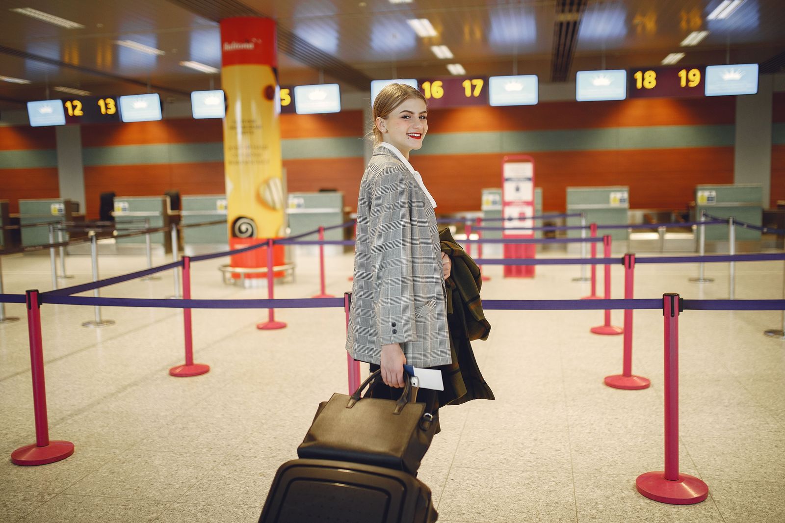 Inside the arrivals hall: the name board, the chauffeur, the passenger's name pronounced correctly